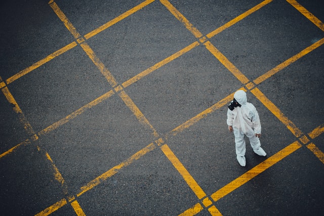 Aerial shot shot of a person wearing personal protective equipment