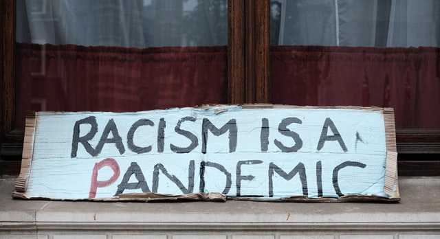 "Racism is a Pandemic": Sign from a Black Lives Matter Peaceful Protest in London